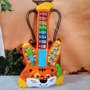 VTech Zoo Jamz Tiger Rock Guitar - Interactive Musical Toddler Learning Toy